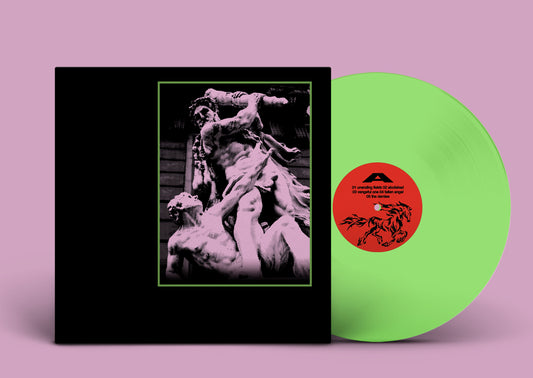 A vinyl record partially pulled from its sleeve, shown on a solid pink background. The record is a bright neon green, and the sleeve is black with a central black-and-white photograph of a classical sculpture framed by a thin green border.